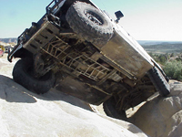 Hummer H1 doing a wheelstand on Secret Trail in Farmington, NM.