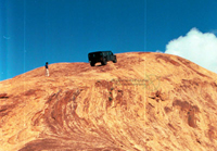 Green Hummer wagon in Moab, Utah
